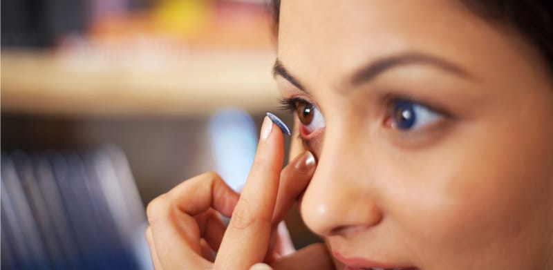 woman wearing colored contacts