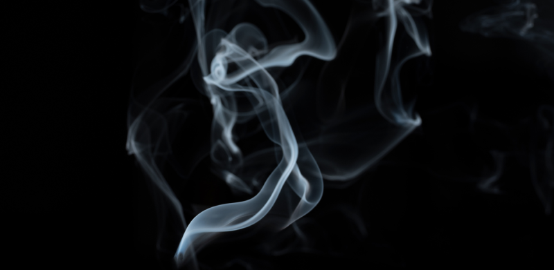 What effect does smoking have on contact lenses?